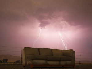 Sofa outside in a storm
